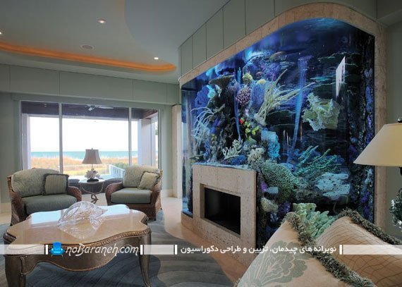 تزیین دیوار اطراف شومینه با آکواریوم بزرگ