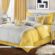 روتختی و روبالشی طرحدار با رنگ بندی زرد و طوسی، روتختی شیک و زیبا با رنگ بندی زرد، طراحی دکوراسیون اتاق خواب با رنگ زرد