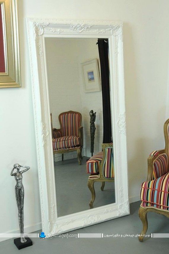 آینه بزرگ و تزیینی سفید رنگ قاب دار کلاسیک و سلطنتی برای تزیین اتاق پذیرایی و اتاق عروس. طرح و مدل های جدید آینه دکوراتیو قدی شیک و فانتزی با قاب سیاه و سفید. آینه تزیینی و دکوراتیو بزرگ قدی