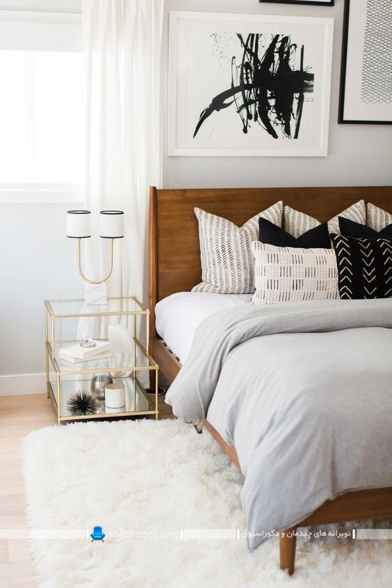 طراحی دکوراسیون شیک اتاق خواب به سبک مدرن و نیمه کلاسیک. طرح جدید تخت خواب چوبی دو نفره ساده شیک به همراه میز پا تختی شیشه ای فانتزی.