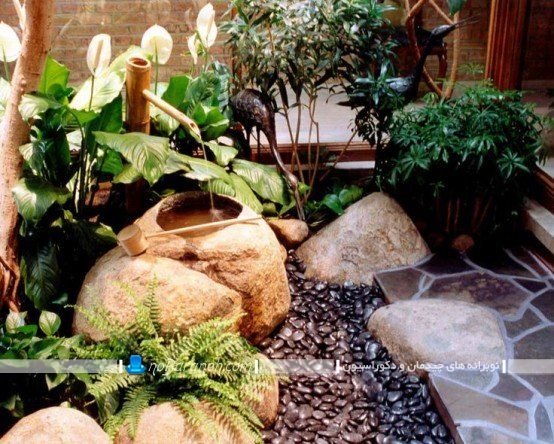 مدل حیاط خلوت کوچک و پاسیو زیبا، طراحی دکوراسیون تراس با سنگ و گیاهان و آبنما به شکل شیک و مدرن