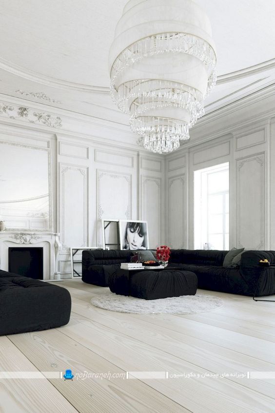 دکوراسیون شیک و مدرن پذیرایی به سبک پاریسی. مدل لوستر سلطنتی اتاق پذیرایی با ابعاد بزرگ و ست شده با گچبری سلطنتی اتاق پذیرایی.